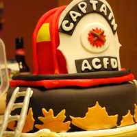 Firefighter Cake I did this cake for an Atlantic City Fire Fighter who is retiring. I replicated his helmet. I'm very happy with the helmet, but not so...