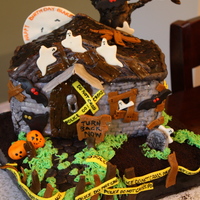 Spooky, Halloween, Haunted House, Graveyard, Bats, Cats, Ghosts, Pumpkins, Graves, Scary This was the very first cake I made for profit. The graveyard and the house are all cake, covered in fondant. The shingles I used were...