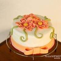 My Very First Mmf Cake! This is a carrot cake filled with whipped cream cream cheese frosting.Please tell me what you think. :)