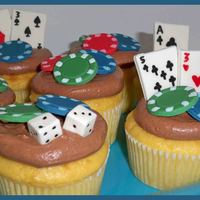 Gambling Lovers Cupcakes! These were made for my mother....who enjoys all types of gambling! Chocolate, strawberry cheesecake cupcake (grahm bottom, strawberry...