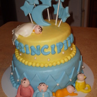 Babies! All Strawberry, with buttercream filling, and buttercream frosting covered in MMF. All babies were edible made out of fondant. Top tier is...