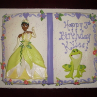 Princess And The Frog Princess and the Frog story book. Buttercream frosted, scroll work and writing (sorry so messy looking, one of my meds was making me shake...