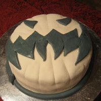 White Pumpkin A 4" torted chocolate cake. Iced with vanilla buttercream, covered in MMF. (Didn't have time to allow for settling; hence the...