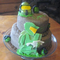 Halo Birthday Cake My nephews Birthday Cake. My special chocolate cake! It is a two tier (9 and 6) with chocolate buttercream. Fondant 2D Halo-man, fondant...