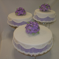 Staggered Wedding Cake With Purple Underlay & Stringwork 