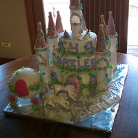 Bailee's Birthday Cake Birthday cake for a 4 year old girl who wanted a princess, cat and horse cake. The cake is buttercream with royal flowers. The towers are...