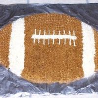 Football Cake This is the first shaped pan cake I ever attempted to do. It turned out OK!