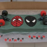 Spiderman Skateboard The ends of the board are chocolate cake & the middle is white cake & the whole thing is iced in BC. The wheels are rice krispie...