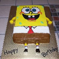 Spongebob 9x13 cake iced in BC. The legs and arms are fondant. Still practicing my writing abilities :)