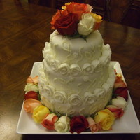 Three Tier Fondant And Real Roses Cake 