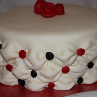 20's Cake Cake I made for a 1920's themed auction. Cake is Lemon Wasc with white chocolate ganache and buttercream and MMF