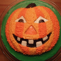 Halloween Pumpkin Pumpkin top (shaped pan) layered on an 8" round base. All bc frosting. Thanks for looking!