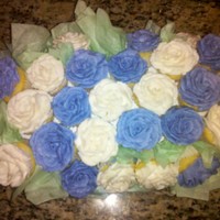 Mini Cupcake Bouquet Made with two dozen mini cupcakes. My first cupcake bouquet with my first attempt at making buttercream roses, thanks to YouTube!