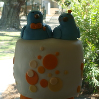 3-Tier Round Wedding Cake cake topper for 3-tier MMF covered round wedding cake. Topper made from modeling chocolate, bluebird bride & groom.