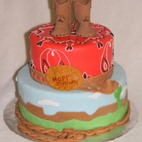 Cowboy Birthday I had a lot of issues with the bandanna look since I am still developing my piping skills but I love the overall look of this cake.