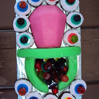 Ring Pop Cake My daughter LOVES ring pops so I tried my hand at making her a cake in the shape of one. I was very happy with how it turned out!I used two...