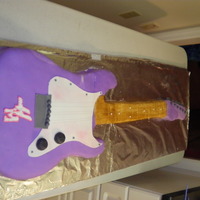 Guitar Cake Used 4 chocolate sheet cakes, buttercream icing, buttercream fondant. Used silver thread for strings. I traced my husbands guitar onto...