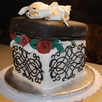White & Black Gift Box This was a small gift box cake my daughter and I made for my aunt. She loved the cake.