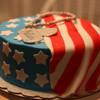 Deployment Cake Buttercream frosting, fondant flag and fondant accents.