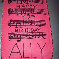 Music Cake It is all buttercream, except the black piano keys and the notes on top are royal icing.