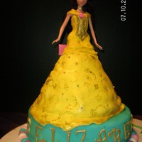 Beauty And The Beast Strawberry Cake with cheesecake frosting for Bell and Chocolate with chocolate for the base cake.