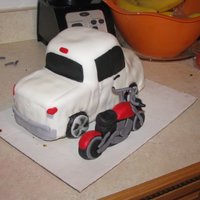 Toyota Tundra And Motorcycle I made this cake for my dad, its his truck Toyota Tundra, and his motorcycle.. I made the motorcycle out of fondant... the truck has...