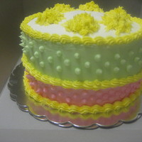 Botanic Rainbow Cake From Wilton Website Customer sent me the cake idea and asked if I could make it. 4 layers of French Vanilla and Butter yellow alternated. BC icing with shaggy...