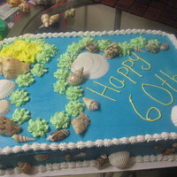 60Th Anniversary 1/2 sheet cake (french vanilla) with buttercream icing, BC roses/carnations, real seashells