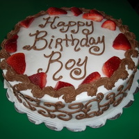 Chocolate With Strawberries This is a double layer round chocolate cake filled with strawberries, covered in buttercream, then topped with fresh strawberries and...