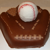 Baseball Mitt & Baseball Field Cake I made a baseball mitt with a rkt baseball inside, and another 8" square cake of a baseball field. The ball is a little bumpy, but I&#...