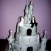 Count Dracula And His Brides Castle Made up of fruit cakes this is a wedding cake made for a gothic couples wedding. It has bats on wires, the count & his bride, a dead...