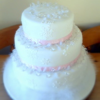 Christmas Christening This is a very over the top Christening cake for a baby girl.