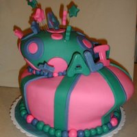 Alivia Vanilla cake with Vanilla Buttercream and Strawberry MMF1st topsy turvy cake and 1st one covered in MMF