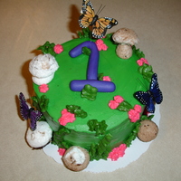 Smash Cake Garden themed smash cake. Mostly the bday girl ate the meringue mushrooms