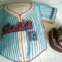 Old Time Baseball Hand carved baseball jersey, glove, and ball. Made to look like old time baseball jerseys. This is all cake and buttercream frosting.