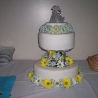 The "everything Went Wrong Cake" Yellow cake, with buttercream filling. Fondant with real flowers