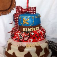 Cowgirl Birthday red velvet w/ cream cheese icing all covered in fondant for a little girl's 1st bday party! TFL!