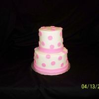 Pink Polka Dots 4" and 6" rounds, buttercream with fondant accents