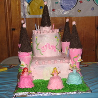 My First Castle Cake This is my first castle cake. I made it for my 4 yr old triplets.