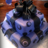 Circles And Bows For a 12 years old's birthday. She wanted purple fondant with a black bow and circle accents. MMF on buttercream. MMF + gumpaste for...