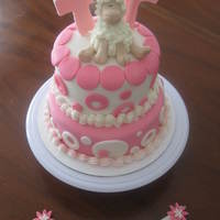 Baptism Cake Here is a little girls Baptism cake. 8in. & 6in. Lemon Poppyseed Cake with Buttercream frosting. Covered and decorated with MMF. This...