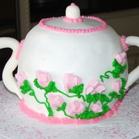 Teapot.jpg All buttercream with royal icing rose buds. Fondant handle and spout.
