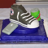 Converse Cake Chocolate Converse cake covered with fondant/rice krispie iPhone and Mt. Dew can.