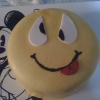 Smilie a cute smilie cake made one night when I got really bored and wanted to try out my new airbrush... =)