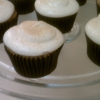 Carrot Cake Carrot cake cupcakes topped with smooth and creamy cinnamon cream cheese
