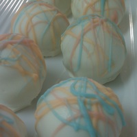 Cake Truffles These are my first attempt at truffles. These are confetti cake balls with peanut butter centers and coated in white chocolate, delish!