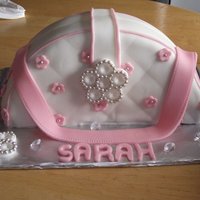Handbag Cake I actually made this cake by accident, I had planned on a 2 tier cake with a pink bow/broach but the top tier broke so i decided to make...
