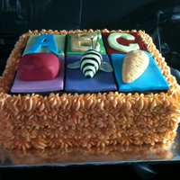 Abc Kids Cake Moist chocolate cake with peanut butter ganache filling. Had fun making this one :)