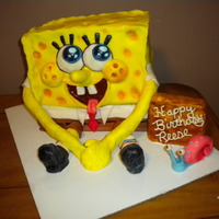 Sponge Bob Cake I made this cake with a sheet cake stack up on dowel rod and covered and decorated with fondant. The little girl loved it = )