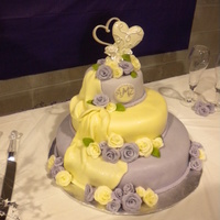 White And Purple Rose Wedding Cake I made this cake for my daughter's wedding it is my very first one and my first time making my roses out of by hand with no cutters or...